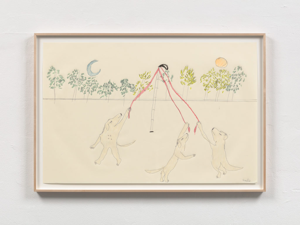 A landscape drawing of three golden Labrador Retrievers with human arms and hands dancing on their hind legs around a Maypole, which raises out from the ground in the center of the drawing. The Maypole is drawn to resemble my extendable white cane, with a cane tip, and a black looped handle. There are three pink dog leashes coming out from the top of the white cane maypole, which each dog holds onto as they circle around it. There are trees in the background, above the trees in the sky is a pale blue crescent moon at the top left, and an yellow orange sun in the top right. There are red flowers on the ground, and the colors of the trees feels like the birth of spring.