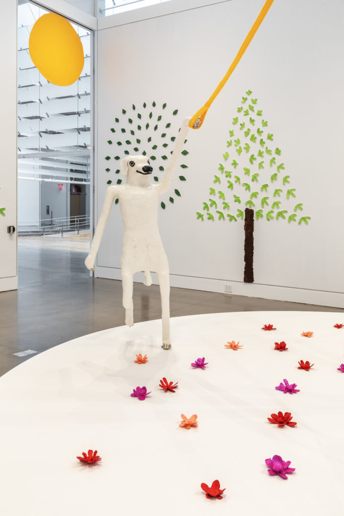 Install shot White Cane Maypole Dance Yellow Leash London frontal view + west side trees + sun_full length