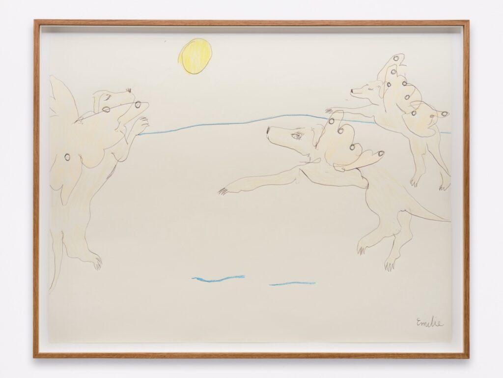 "London Afterlife" is a colored drawing on white paper. The drawing is framed in oak. Created with ballpoint pen and crayon, the image depicts three representations of a blonde-haired English Labrador Retriever with peach-colored butterfly wings emerging from their backs. These avatars flutter in the sky beneath a warm, bright yellow sun.