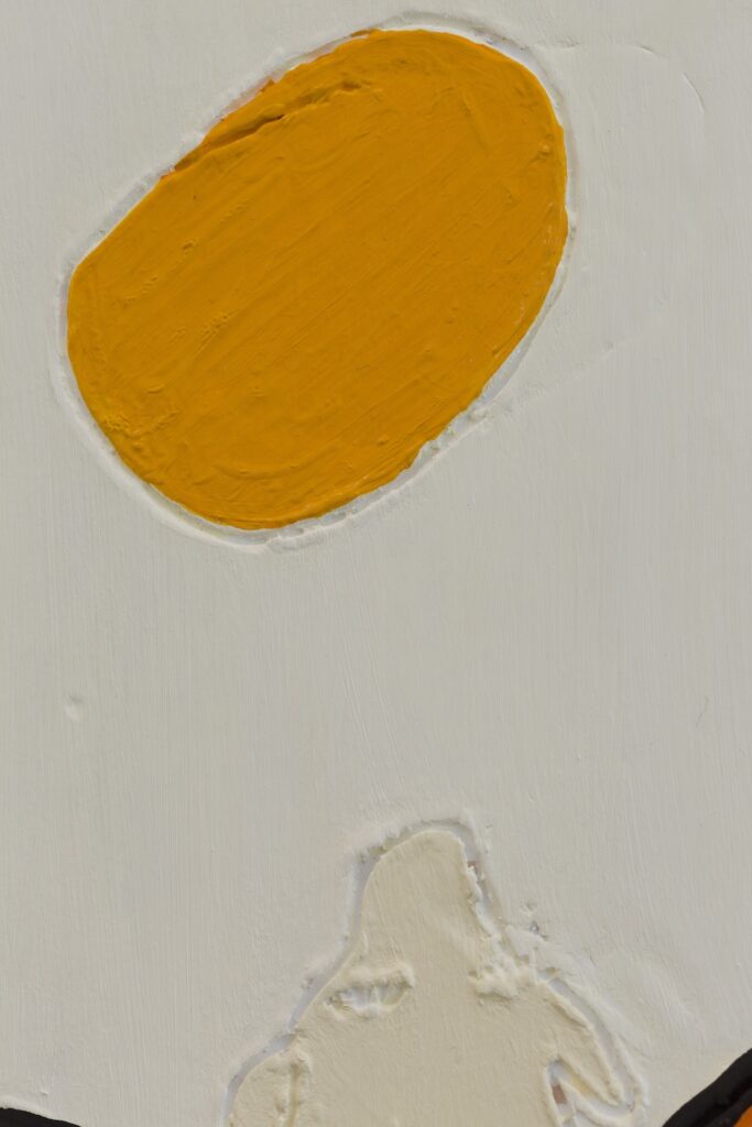A detailed view of the golden yellow sun.